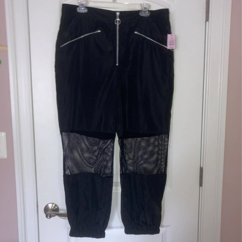 NWT wild fable pants with fishnet cut outs